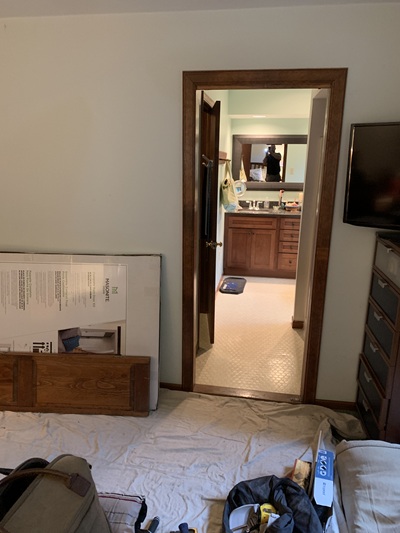 Barn door installation for a bathroom